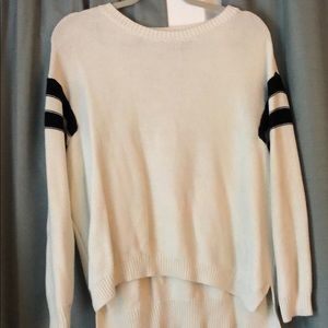 White sweater with black stripped sleeves